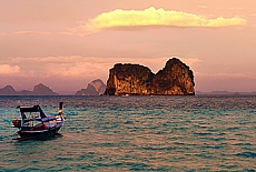 Longtailboats at sunset on Ko Ngai Island