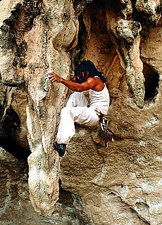 Climbing on the limestone rocks of Raileh