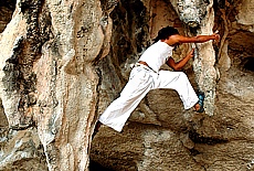 Climbing in the limestone rocks of Raileh