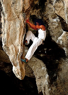 Climbing on the limestone rocks of Raileh