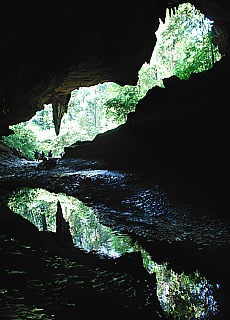 Entrance to limestone cave Nam Tha Loo at Cheow Lan lake