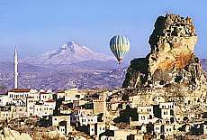 View on Uchisar and the snowcovered volcano Erciyes